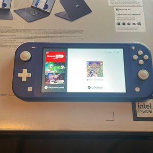 Nintendo switch lite in purple